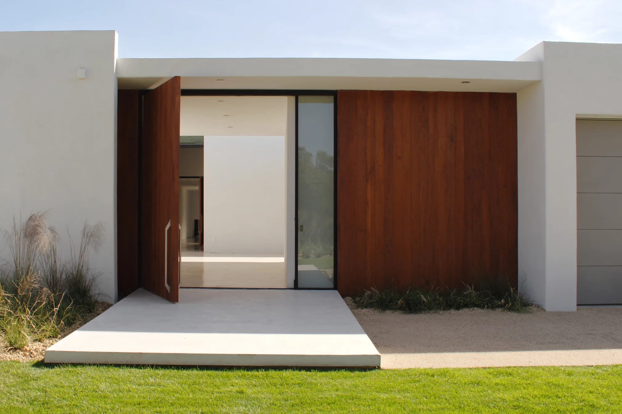 The open front door of a modern home
